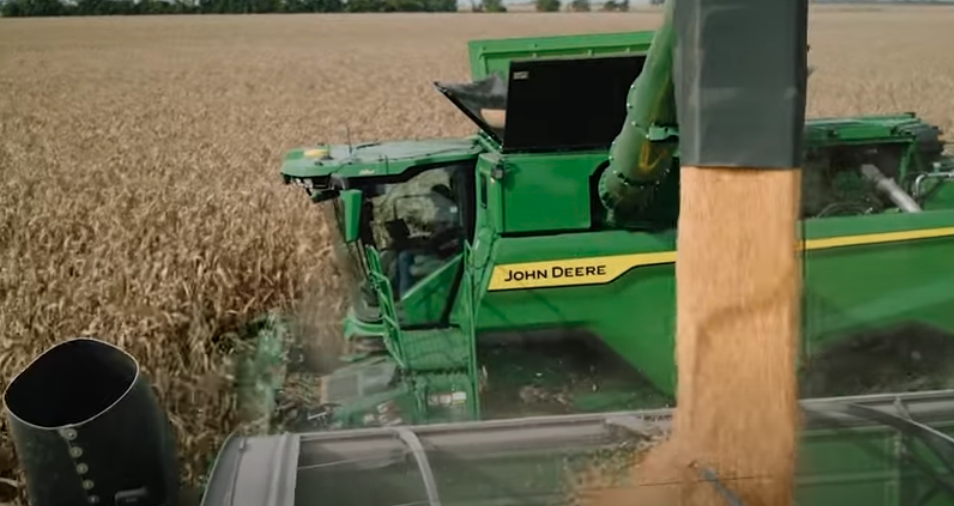 A still image of a John Deere combine.